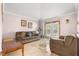 Spacious living room with neutral decor at 30549 Pga Dr, Sorrento, FL 32776