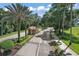 Gated community entrance with landscaping at 5120 Tanzanite Dr, Mount Dora, FL 32757