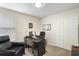 Home office with a desk, chair, and built-in shelving at 5120 Tanzanite Dr, Mount Dora, FL 32757