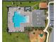 Community pool, playground, and clubhouse at 1565 Tali Ln, Mount Dora, FL 32757