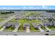 Community overview showcasing various homes at 1565 Tali Ln, Mount Dora, FL 32757