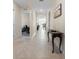 Bright entryway with tile floors and console table at 1565 Tali Ln, Mount Dora, FL 32757