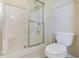Bathroom with shower stall and toilet at 34416 Tuscany Ave, Sorrento, FL 32776