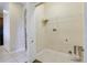 Laundry room with hookups and shelving at 34416 Tuscany Ave, Sorrento, FL 32776