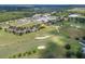 Aerial view showing home location near golf course and amenities at 34416 Tuscany Ave, Sorrento, FL 32776