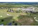 Aerial view highlighting home's location on the golf course at 34416 Tuscany Ave, Sorrento, FL 32776