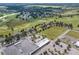 Aerial view showing home's location near golf course and retail at 34416 Tuscany Ave, Sorrento, FL 32776