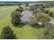 Aerial view of a home situated on a golf course at 34416 Tuscany Ave, Sorrento, FL 32776