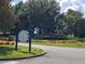 Sorrento Springs Eagle Dunes Golf Club entrance sign and landscaping at 34416 Tuscany Ave, Sorrento, FL 32776