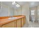 Clean bathroom with wood vanity and single sink at 540 Grand Canal Dr, Kissimmee, FL 34759