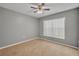 Simple bedroom with neutral walls and carpet at 540 Grand Canal Dr, Kissimmee, FL 34759