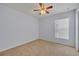 Light and airy bedroom with ceiling fan at 540 Grand Canal Dr, Kissimmee, FL 34759