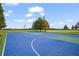 Community basketball court with ample space to play at 901 Egrets Landing Way, Groveland, FL 34736