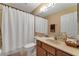 Clean bathroom with shower/tub combo, vanity, and toilet at 13129 Coldwater Loop, Clermont, FL 34711