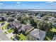 Aerial view of house and neighborhood showcasing the property's location at 13129 Coldwater Loop, Clermont, FL 34711