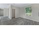 Bright breakfast nook with wood-look floors and built-in shelving at 12332 Basin St, Clermont, FL 34715