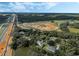 Aerial view of homes near a highway under construction at 12332 Basin St, Clermont, FL 34715