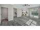 Spacious living area with wood-look floors and access to the backyard at 12332 Basin St, Clermont, FL 34715