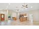 Open living room with high ceilings and tile flooring at 8222 Florida Boys Ranch Rd, Groveland, FL 34736
