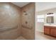 Bathroom with large walk in shower and grab bars at 8222 Florida Boys Ranch Rd, Groveland, FL 34736