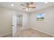 Bright bedroom with tile floors and access to another room at 8222 Florida Boys Ranch Rd, Groveland, FL 34736