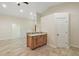 Bright dining area with wood cabinets and French doors at 8222 Florida Boys Ranch Rd, Groveland, FL 34736