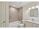 Updated bathroom with tile shower and vanity at 8222 Florida Boys Ranch Rd, Groveland, FL 34736