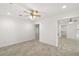 Bright bedroom with tile floors and access to other rooms at 8222 Florida Boys Ranch Rd, Groveland, FL 34736