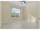 Bright bedroom featuring neutral walls and tile flooring at 25304 Forest Oak Ct, Leesburg, FL 34748