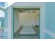 Neat and organized garage with painted floor and storage at 25304 Forest Oak Ct, Leesburg, FL 34748