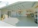 Garage with ample storage and room for two cars at 25304 Forest Oak Ct, Leesburg, FL 34748