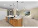 Kitchen with island, stainless steel appliances at 25304 Forest Oak Ct, Leesburg, FL 34748