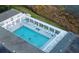 Relaxing resort-style pool with plenty of lounge chairs at 25304 Forest Oak Ct, Leesburg, FL 34748