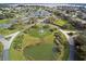 Aerial view of community amenities and lakefront at 6062 Armada St, Tavares, FL 32778