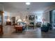 Comfortable living room featuring a fireplace and plenty of seating at 6062 Armada St, Tavares, FL 32778