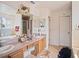 Elegant bathroom with and sinks and a large mirror at 18744 Sabal St, Orlando, FL 32833