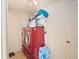 Laundry room with washer, dryer, and extra storage at 18744 Sabal St, Orlando, FL 32833