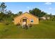 Small guest house features a private entrance and patio seating at 18744 Sabal St, Orlando, FL 32833