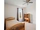 Charming bedroom with polka dot bedding and wood frame bed at 18744 Sabal St, Orlando, FL 32833
