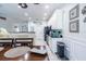 Modern kitchen with white cabinets and granite countertops at 615 Del Pilar Dr, Groveland, FL 34736