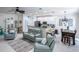 Open concept living area with kitchen and dining area at 615 Del Pilar Dr, Groveland, FL 34736
