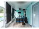 Covered lanai with patio furniture and a pool view at 615 Del Pilar Dr, Groveland, FL 34736