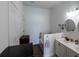 Bathroom with double vanity and soaking tub at 615 Del Pilar Dr, Groveland, FL 34736