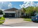 Single-Gathering home with driveway and lawn at 615 Del Pilar Dr, Groveland, FL 34736
