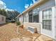 Charming home with a spacious backyard, perfect for outdoor entertaining at 645 Rainbow Blvd, The Villages, FL 32159