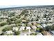 An aerial view of a residential community with diverse architectural styles and lush greenery at 17755 Se 85Th Ellerbe Ave, The Villages, FL 32162