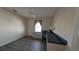 Office space with built-in desk, window, and wood-look floors at 17755 Se 85Th Ellerbe Ave, The Villages, FL 32162