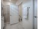 Clean bathroom with shower, toilet and granite vanity at 5035 Stokes Way, Wildwood, FL 34785