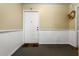 Inviting condo entryway with neutral walls and flooring at 1010 Loch Vail # 1112, Apopka, FL 32712