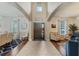Grand entryway with high ceilings, tile flooring, and access to living and dining areas at 349 Morning View Dr, Winter Garden, FL 34787